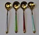 4 enameled 
gilded tea 
spoons, 20th 
century. 
Stamped: 930. 
Length: 13.2 - 
13.5 cm. 2 
sizes. Total 
...