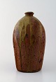 Dorthe Møller, 
own workshop, 
ceramic vase in 
rustic style. 
Raku burned. 
glaze in brown 
...