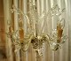 Venetian 
chandelier, 
20th century. 
Italy. Clear 
glass. With 5 
light arms. 5 
hanging leaves, 
4 ...