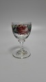 Enamel 
decorated wine 
glass Height 
11.5cm.ca year 
1860