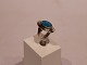 Ring with blue 
stone of 925 
sterling 
silver.
Size 59.
