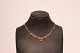 Necklace of 925 
sterling silver 
and amber.
45 cm.