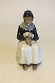 Royal 
Copenhagen 
Figurine of 
Woman with 
Cloth No 1317. 
Measures 22 cm 
/ 8 21/32 in. 
Marked as a ...