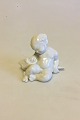 Bing &Grondahl 
Blanc de Chine 
Figurine of 
Child leaning 
against Fish No 
4037. Designed 
by Kai ...