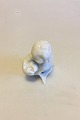 Bing & Grondahl 
Blanc de Chine 
Figurine of 
Child looking 
down at Fish No 
4034. Designed 
by Kai ...