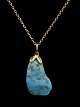 14ct gold 
necklace 48 cm. 
and turquoise 
pendant 2.2 x 
1.2 cm. No. 
352812