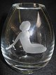 Holmegaard 
crystal vase 
with grinding 
in the form of 
a sitting naked 
woman. Signed: 
Holmegård ...