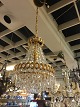 Beautiful Prism 
chandelier.
with gilded 
frame.
Height: 37 cm. 
height with 
chain: 70 cm. 
you ...