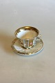 Faceted coffee 
cup decorated 
with roses and 
gold. Probably 
German. 
Measures cup: 7 
cm / 2 3/4 ...