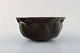 Axel Salto for 
Royal 
Copenhagen: 
Stoneware bowl, 
modeled in 
organic form, 
decorated with 
glaze ...