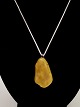 Sterling silver 
chain 40 cm. 
with amber 
pendant 2.4 x 
3.7 cm. No. 
355009