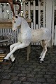 Large decorative Swedish 1800's horse in carved wood.The horse has glass eyes, leather ear, ...