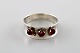 Bo Davidsson, 
Swedish 
silversmith. 
Modernist 
silver ring 
with red 
stones. Dated 
1962.
Size: 13 ...