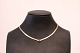 Necklace with 
clear stone of 
silver from 
Italy.
44 cm.