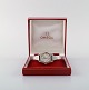 Omega 
Geneva/Geneve 
Ladies Silver 
Dial Watch with 
original box. 
1972.
In good 
condition.
The ...
