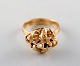 Hermann 
Siersbøl, 
Danish 
goldsmith. 
Organic ring in 
14 carat gold. 
1960's.
In very good 
...