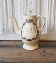 English 
creamware 
coffee pot from 
the end of the 
18th century. 
Remains without 
lid.
Height 20 cm.