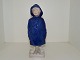 Bing & Grondahl 
figurine, boy 
in blue 
raincoat.
The factory 
hallmark shows 
that this was 
...