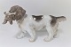 Bing & 
Grondahl. 
Cocker Spaniel 
with bird in 
mouth. Model 
2061. (1 
quality). 
Length 24 cm.