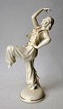 Figure, 
oriental 
dancer, 
Schaubach, 20th 
century 
Germany. Cream 
colored with 
gilding. 
Stamped. ...