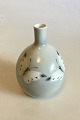 Heubach Lichte 
Vase decorated 
with two 
Butterflies. 
Signed G. 
Stauch. 
Measures 15 cm 
/ 5 29/32 in.