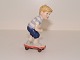 Royal 
Copenhagen 
figurine from 
the Mini 
collection, boy 
on skateboard.
Decoration 
number ...