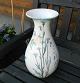 White glazed 
ceramic vase 
decorated with 
flowers. 
Produced by 
TORBEN 
ceramics. In 
perfect ...