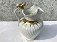 Chocolate jug, 
with lion and 
optical stripes 
and gold 
decoration, 
25cm high, 16cm 
wide * Worn in 
...
