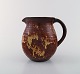 Michael 
Andersen, 
Denmark jug 
with handle. 
Beautiful glaze 
in red and 
yellow shades. 
1950 / ...