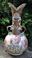 Large Satsuma 
floor vase, 
19th century 
faience. With 
handles. With 
numerous 
decorations of 
men. ...