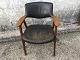 Erik 
Kirkegaard. 
Armchair. 
Lacquered beech 
and black 
leather. Nice 
used condition, 
though ...