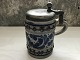 German beer mug 
of salt-glazed 
stoneware, 18cm 
high, 8cm in 
diameter, * 
With crack *