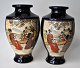 Pair of 
Japanese signed 
Satsuma vases, 
faience, 
approx. 1900. 
Hand decorated. 
Polycrome ...