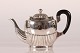 Silversmith 
August Thomsen 
Empire style 
silver Teapot 
from 1918 
with solid  
handle of ...