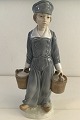 Lladro, Dutch 
Boy with 
milkpails, No 
4811 H 22 cm 
(8.66 in)