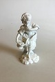 Royal 
Copenhagen 
Bisque Figurine 
of Girl with 
Flowerbasket. 
Measures 19 cm 
/ 7 31/64 in.
