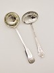 Silver sugar 
spoons antik 
solgt 14.5 cm. 
musling sold 
16,5 cm.        
   No. 369401