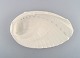Wilhelm Kåge 
for Gustavsberg 
studio hand. 
"Carrara" bowl 
in the shape of 
a clam. White 
glaze and ...