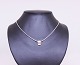 Necklace with 
pendant of 925 
sterling silver 
with clear 
stone, stamped 
JAa.
42 cm x 1,3 cm 
x ...