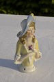 Porcelain 
figurine. Half 
pin cushioon 
doll, Height 9 
cm. 3 9/16 
inches. Fine 
condition.