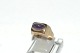 Lady Gold ring 
with purple 
stone 14 carat
Stamped: 585
Size: 59
Nice and well 
maintained
The ...