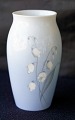 Bing & 
Grøndahl, vase 
57-255, vasen 
er 1. 
sortering. Blå 
tone vase med 
motiv af ...