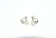 Elegant 
earrings with 
pearl in 14 
carat white 
gold and with 
brilliant cut 
diamonds
Stamp 585 ...