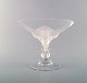 Lalique 
"Virginia" 
compote with 
peacocks in 
clear art 
glass. 1950's.
In very good 
...
