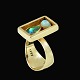Ole Waldemar 
Jacobsen.14k 
Gold Ring with 
drop-shaped 
Opal and White 
Opal - 1965.
Designed and 
...