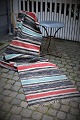 Old Swedish cloth rug in fine colors and good quality. Measures: 480x82cm.