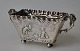 Small silver 
table bowl, 
20th century, 
Europe. With 
two handles and 
four legs. 
Decorated on 
the ...