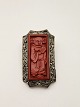 Brooch 4 x 2.4 cm. lacquer surrounded by filigree Nr. 372777