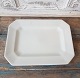 Aluminum edged 
dish in 
cream-colored 
faience. 
Dimensions 
24.5 x 33 cm.