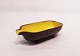 Ceramic bowl on 
feet with brown 
glaze on the 
outside and 
yellow on the 
inside of 
danish design 
...